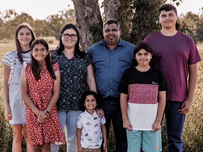 Corinne Lee Cheu (far left) with her family.