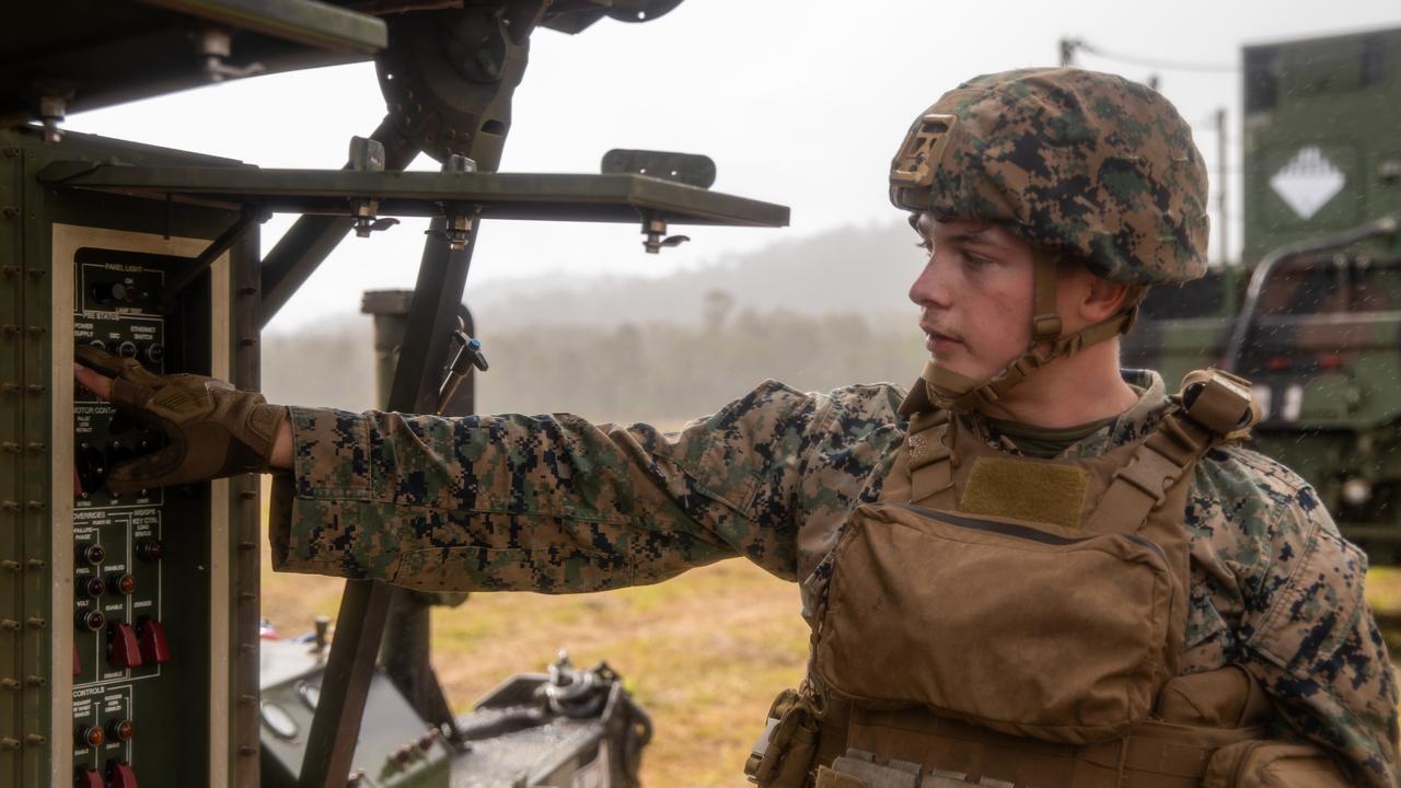 U.S. Marine Corps Lance Cpl. Michael Walker, a field artillery radar operator with 3d Battalion, 12th Marines, 3d Marine Division, raises a Ground Air Task Oriented Radar during Talisman Sabre 2021 at Shoalwater Bay Training Area, Queensland, Australia, July 14, 2021. TS21 is a large-scale, bilateral military exercise conducted biennially across Northern Australia designed to enhance the U.S.-Australia alliance which is an anchor of peace and stability in the Indo-Pacific. Exercises like this provide effective and intense training to ensure our forces are capable, interoperable, responsive, and combat-ready. Walker is a native of Tooele, Utah. (U.S. Marine Corps photo by Lance Cpl. Ujian Gosun)