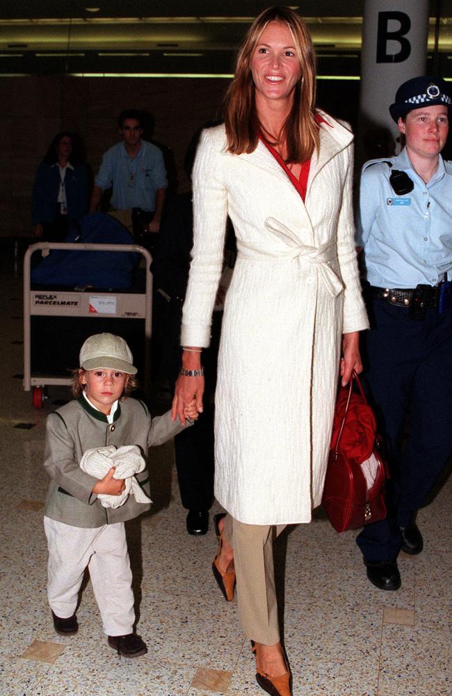 A dapper young Flynn arrives with mum Elle at Sydney Airport for the Olympic Games. Picture: Troy Bendeich