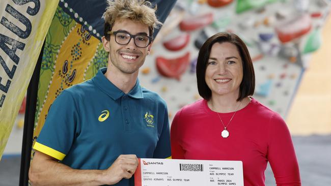 Australian Olympic Team Chef de Mission gives Harrison his ticket to Paris. Pic: Michael Klein