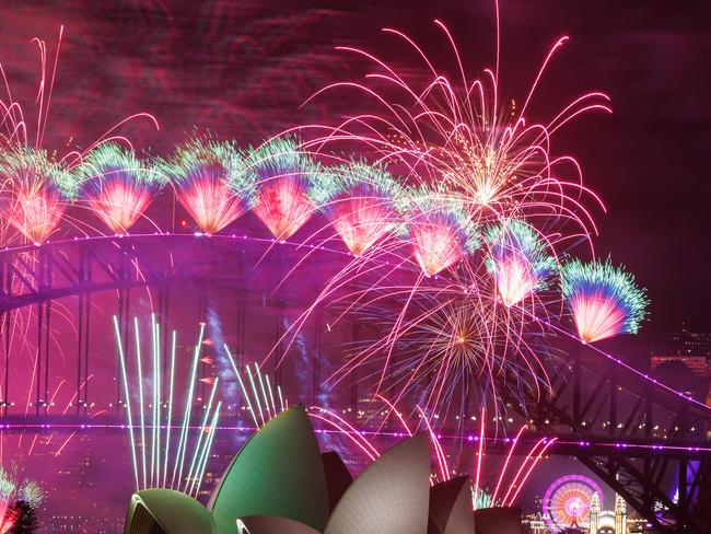 Fireworks light up the night sky to welcome in 2025, from Potts Point, Sydney, today. Picture: Justin Lloyd.