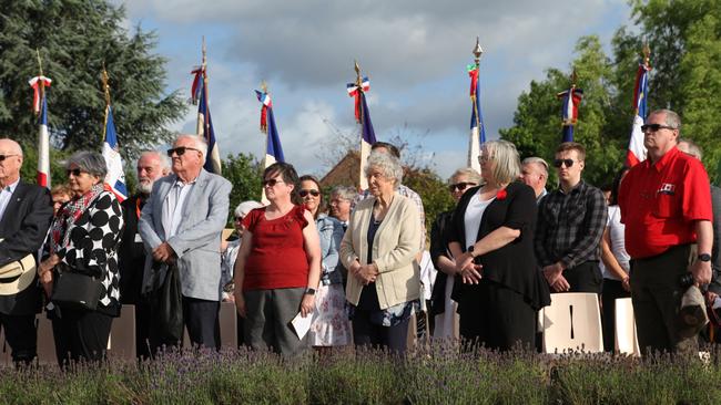 The headstones of seven recently identified Australian soldiers who died at Fromelles in 1916 are rededicated in the presence of some of their descendants. Picture: Australian Army