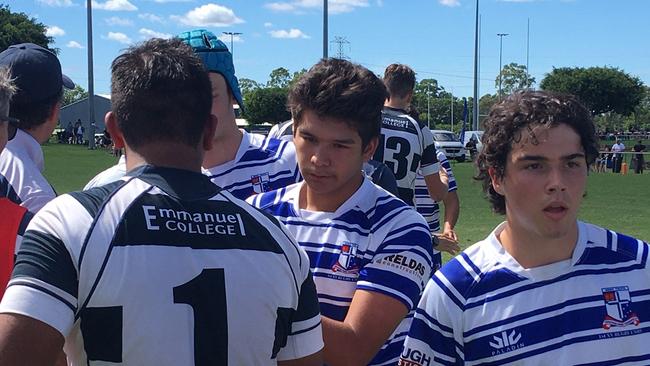 Ignatius Park shake hands after the Div 2 final.