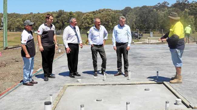 GREEN LIGHT: The upgrade to the Yamba sports complex receives a once over from three tiers of government. Federal MP Kevin Hogan second right, Clarence MP Chris Gulaptis third right and Clarence Valley Council general manager Ashley LIndsay, fourth from right.