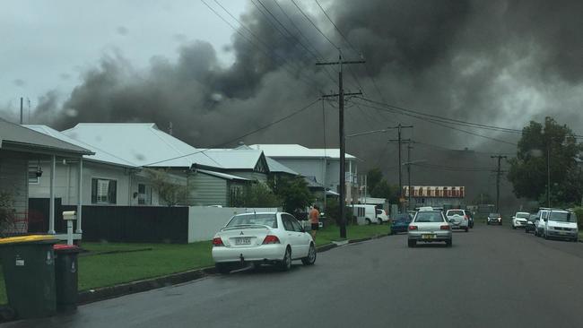 Firefighters are battling a blaze which has broken out in a warehouse on Annie Street at Wickham. Picture: Jen Tarran.