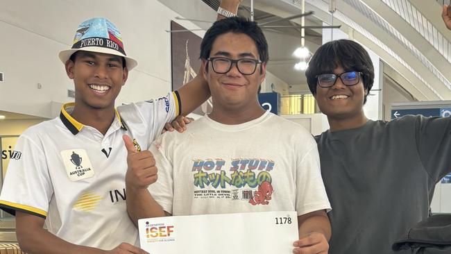 Darwin High School students Pothik Vincent Mondol (left), Monishi Rangchak Tripura (right), and Mohammad Niyaz Hasan (right) came third in their category at the 2024 International Science and Engineering Fair in Los Angeles.