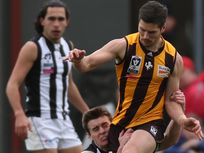 VFL footy: Box Hill v Collingwood at the Box Hill City Oval. Box Hill's Nicholas Evans and Collingwood Callum Matheson. Picture: Brendan Francis