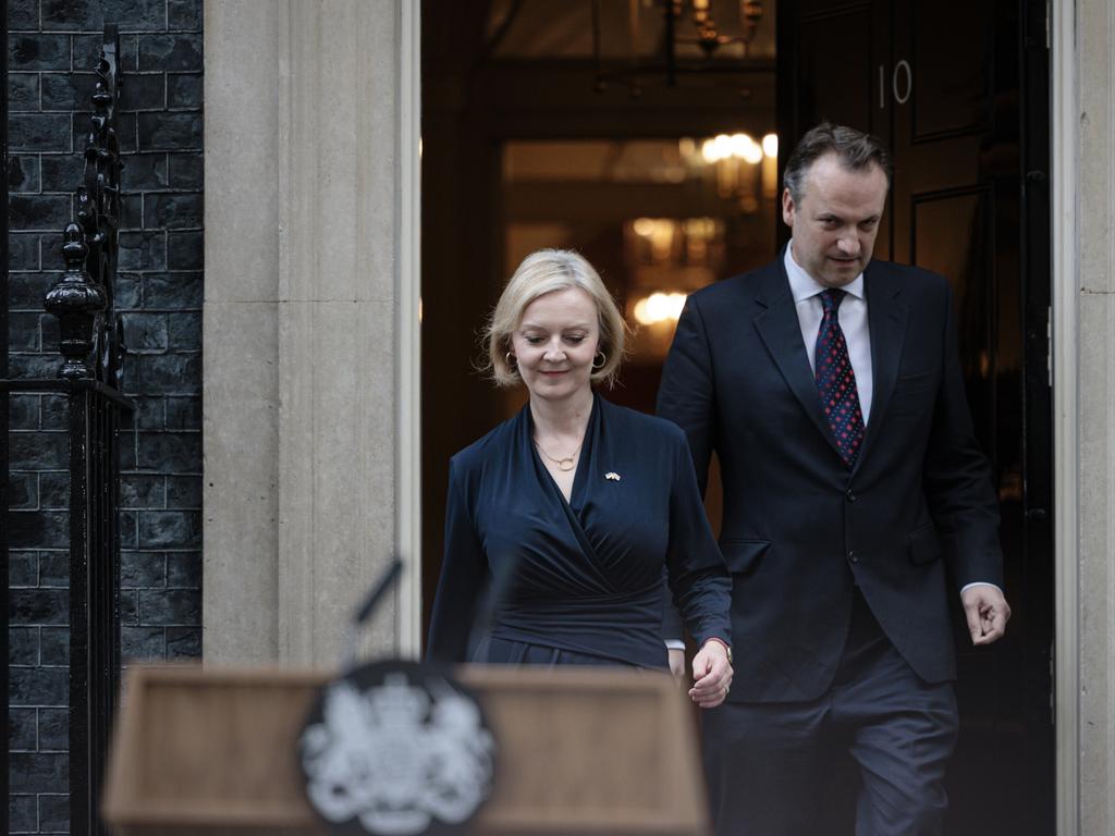 British Prime Minister Liz Truss, with her husband Hugh O'Leary, walks outside Downing Street to deliver her resignation. Picture: Getty Images