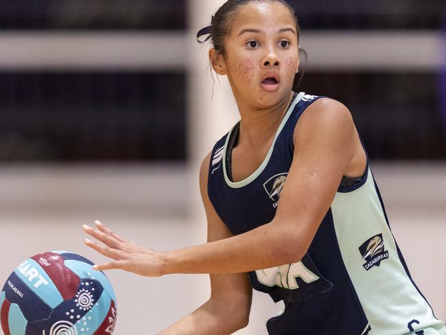 Coomera Anglican College player makes a pass during their game against Wavell State High.