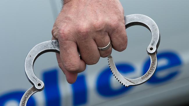 A man was arrested after he was found asleep in the car. Photo: Trevor Veale