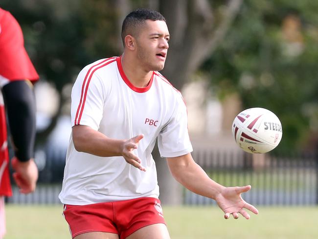 Palm Beach Currumbin are playing in the NRL Schoolboy Cup state final on Wednesday.Photo of Juwan Compain (white shirt).Photo by Richard Gosling