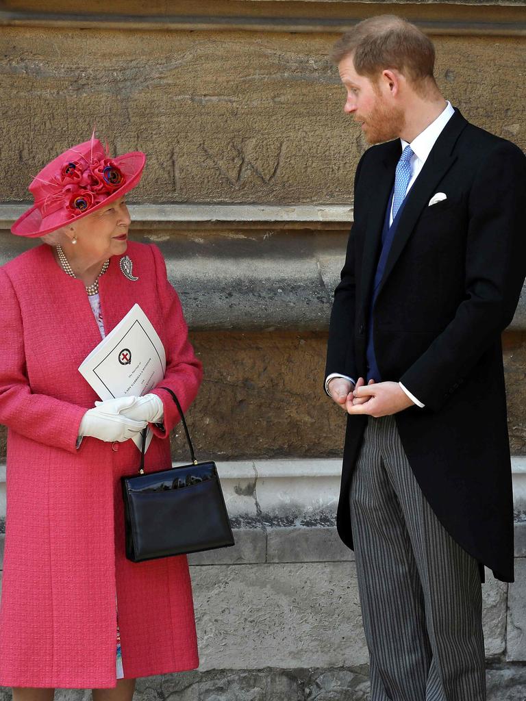 The late Queen Elizabeth and Prince Harry at the couple’s wedding. Picture: Steve Parsons/Pool/AFP