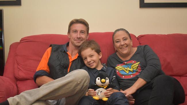 James Selwyn-Smith with dad Anthony Selwyn-Smith and mum Amanda McFarlane at their home in Brassall.