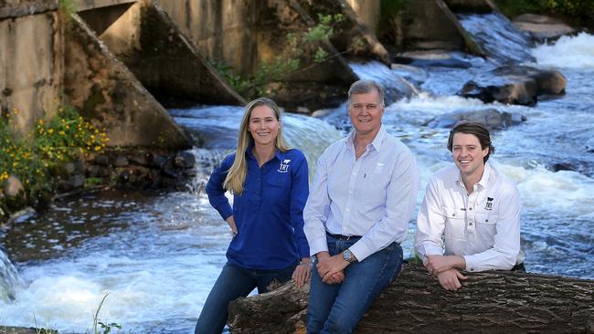 Tim Roberts-Thomson with his children Madeleine and James from TRT Pastoral, Delatite. Picture: Yuri Kouzmin