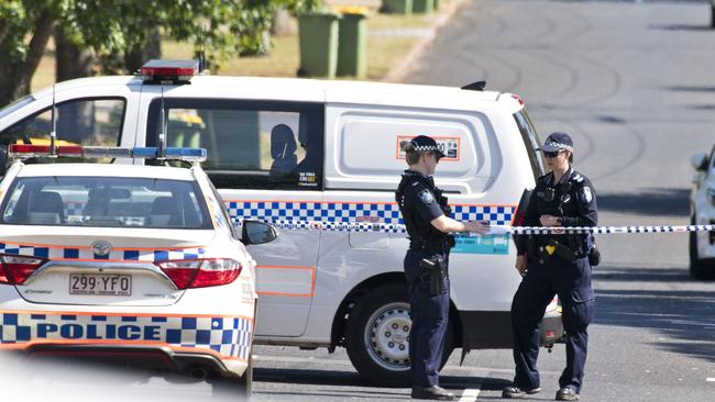 Police and fire investigators at a South Toowoomba crime scene following a fatal house fire in Rivett St, Monday, December 16, 2019. Picture: Kevin Farmer