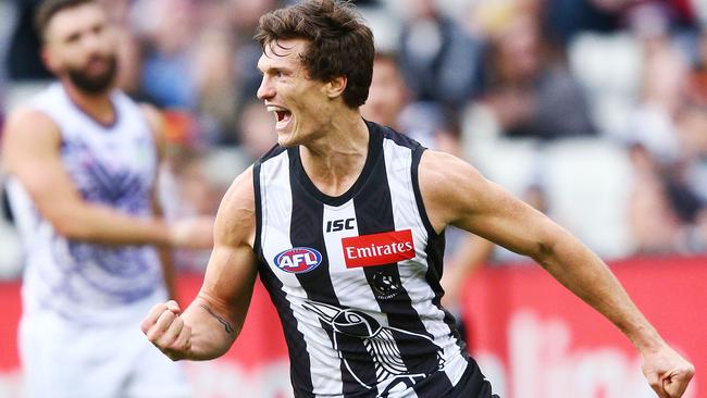 Brody Mihocek celebrates a goal for the Magpies in his AFL debut. Picture: Getty Images