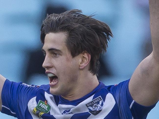 Lachlan Lewis of the Bulldogs kicks the winning field goal during the Round 23 NRL match between the Canterbury-Bankstown Bulldogs and the Warriors at ANZ Stadium in Sydney, Sunday, August 19, 2018. (AAP Image/Craig Golding) NO ARCHIVING, EDITORIAL USE ONLY