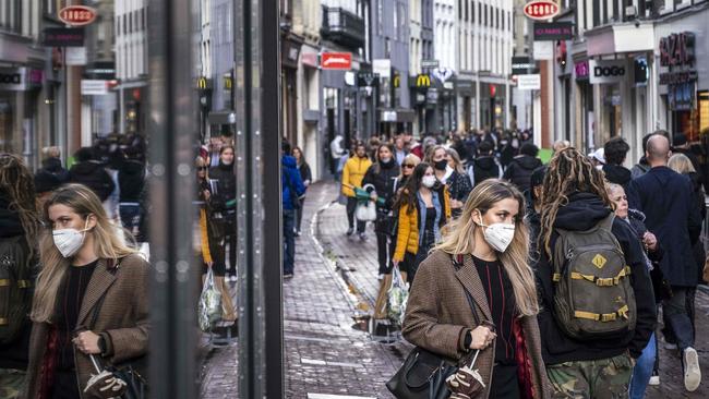 Shoppers in the centre of Amsterdam. The Netherlands is fighting a spike in COVID-19 cases. Picture: AFP