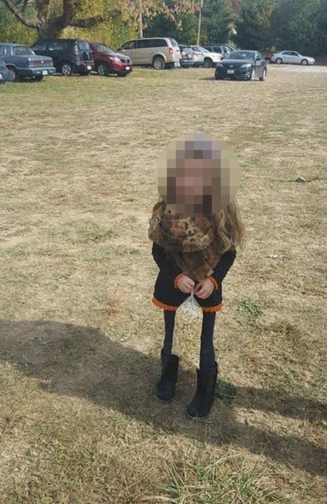 A photo of a little girl standing in the middle of a park has got social media users scratching their heads. Picture: Twitter