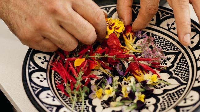 The couple have a variety of a herbs and vegetables growing in their garden that are used in some of the cooking lessons.