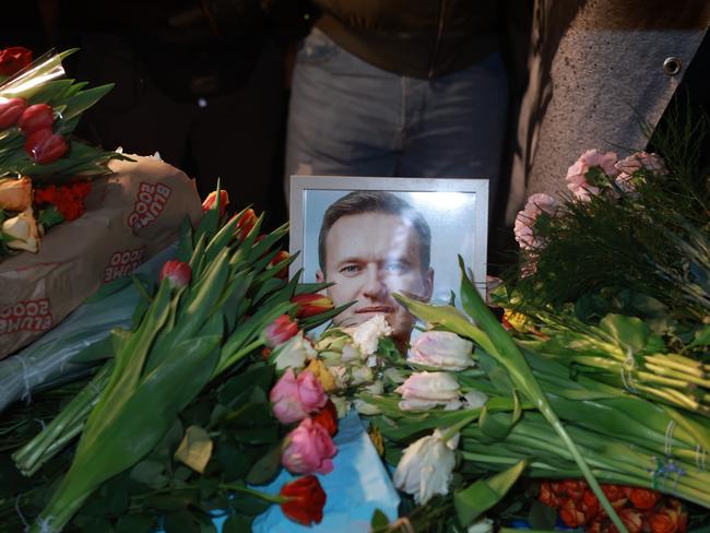 Flowers during a vigil for Alexei Navalny in front of the Russian Consulate General in Munich, Germany. Navalny’s widow says she will carry on her husband’s work. Picture: Getty Images