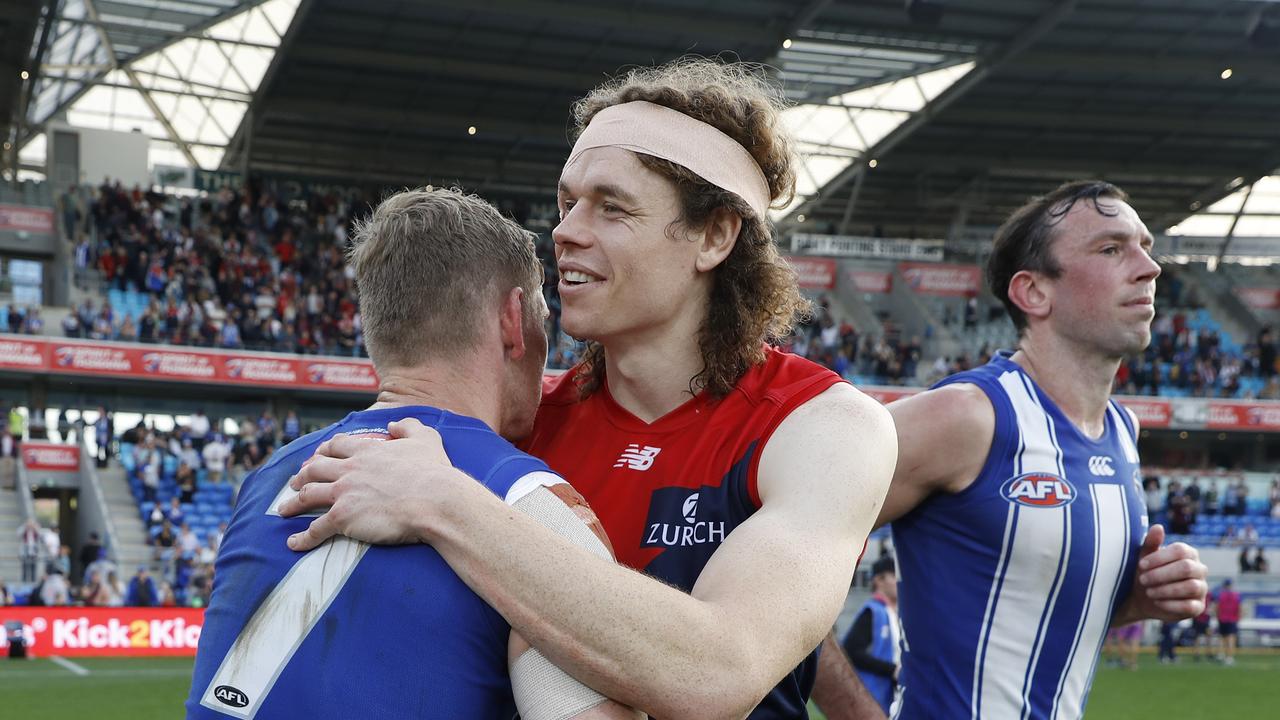 Brown hugs former teammate Jack Ziebell when he clashed with North Melbourne earlier this year. Picture: Dylan Burns/AFL Photos via Getty Images