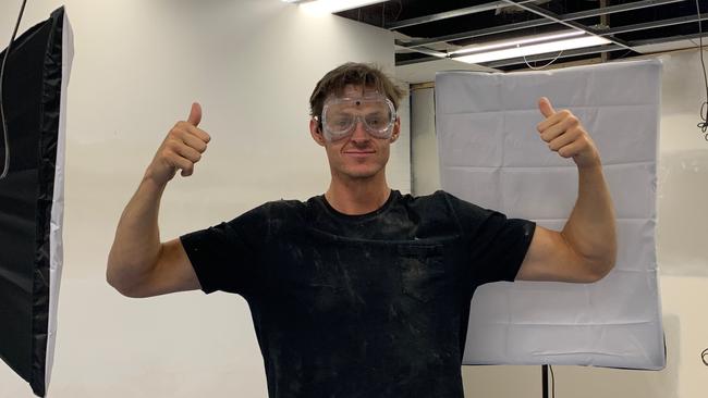 Sydney Swans ruckman Callum Sinclair building his photo studio.