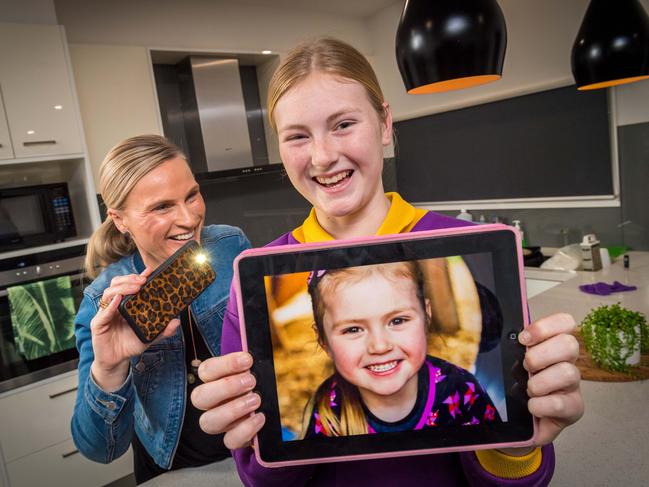 Kylie Capron shows off a picture of her daughter Ruby, 11, when she was a toddler. Picture: Jake Nowakowski