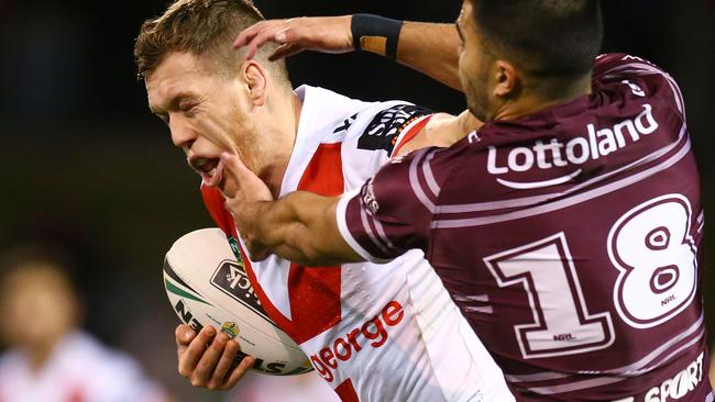 WOLLONGONG, AUSTRALIA — JUNE 16: Cameron McInnes of the Dragons is tackled during the round 15 NRL match between the St George Illawarra Dragons and the Manly Sea Eagles at WIN Stadium on June 16, 2018 in Wollongong, Australia. (Photo by Mark Nolan/Getty Images)