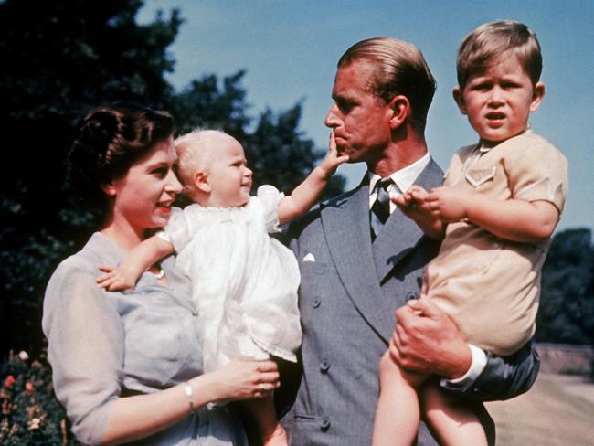 Queen Elizabeth with Prince Philip holding Princess Anne and Prince Charles in 1951. Picture: Photo by Keystone-France/Gamma-Keystone via Getty Images.