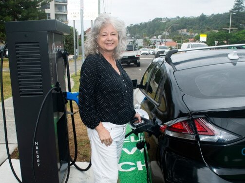 Northern Beaches mayor Sue Heins charging an electric vehicle. Picture: Northern Beaches Council