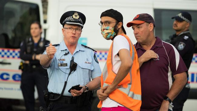 Inspector Tony Ridge with Cr Jonathan Sri at the protest. Cr Sri later posted online that he’d been arrested. Picture: Richard Walker