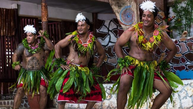 Tongan men performing a traditional dance.