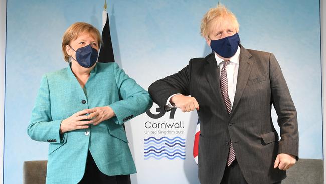 Prime Minister Boris Johnson (right) greets German Chancellor Angela Merkel, ahead of a bilateral meeting during the G7 summit in Carbis Bay, during the G7 summit. Picture: Getty