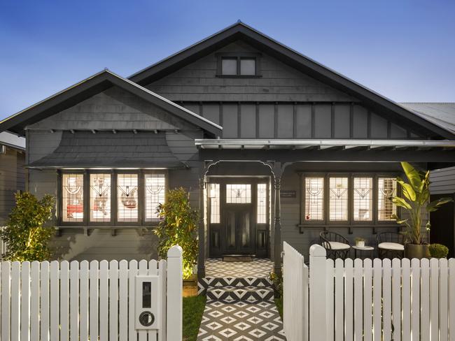 Ronnie and Georgia went for a dramatic colour scheme for their house on Regent Street in Elsternwick.