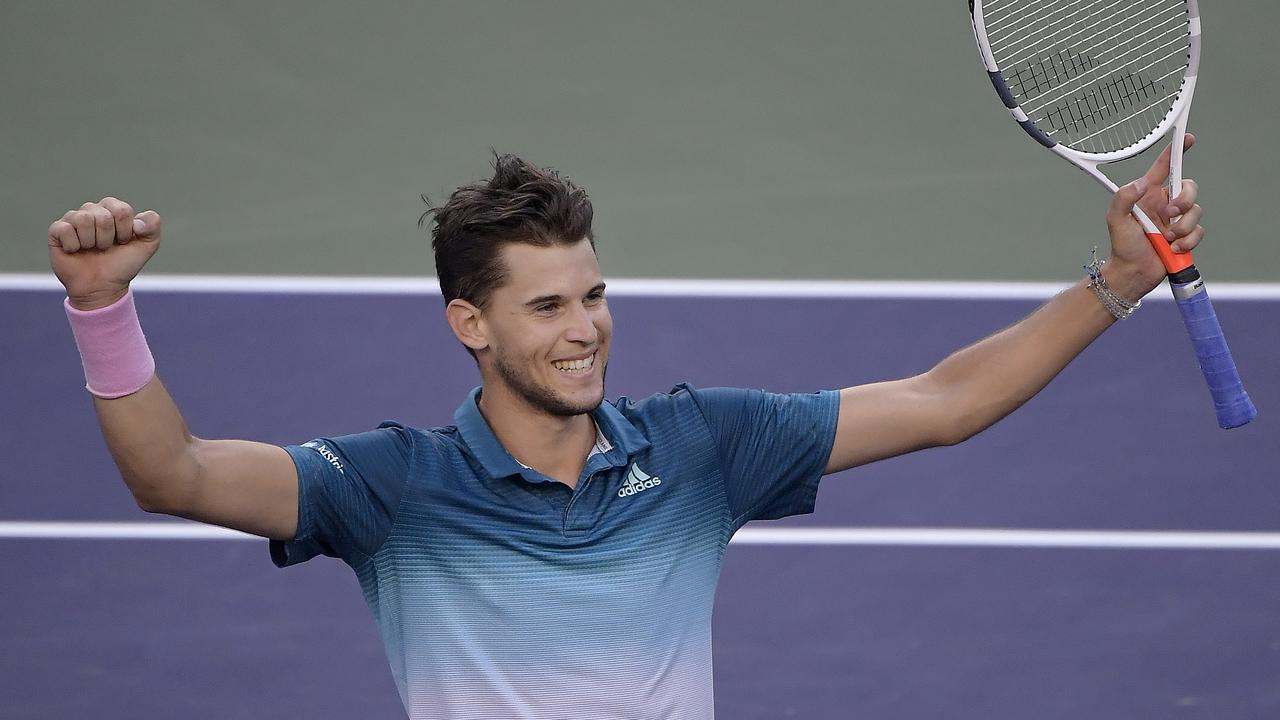Dominic Thiem, of Austria, celebrates after defeating Roger Federer.