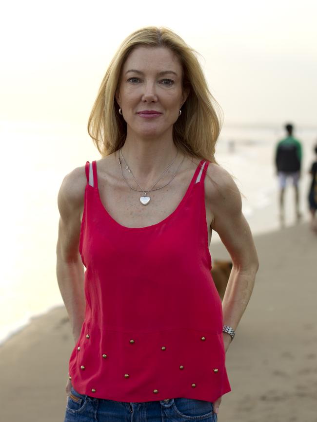 Hotel Kerobokan author Kathryn Bonella on the beach in Bali. Picture: Jason Childs