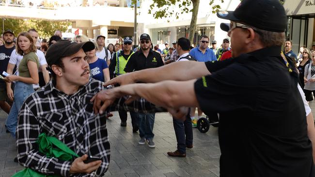 Dennis Huts allegedly pushes a protester at a pro-LGBTI rally in Perth this year.