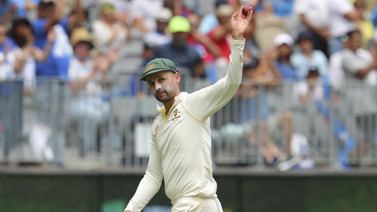 Nathan Lyon salutes the crowd after a five wicket haul. Photo: Trevor Collens. 