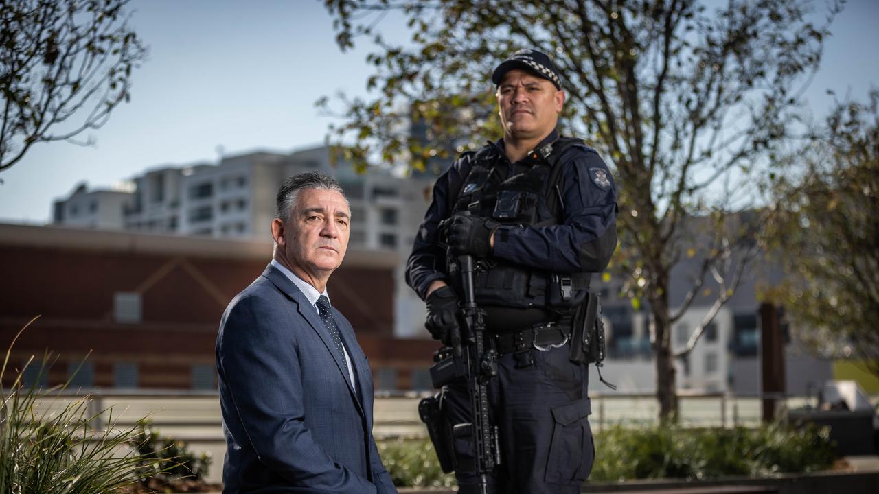 Detective Inspector Anthony Brown with a Public Order Response Team officer. Picture: Jake Nowakowski