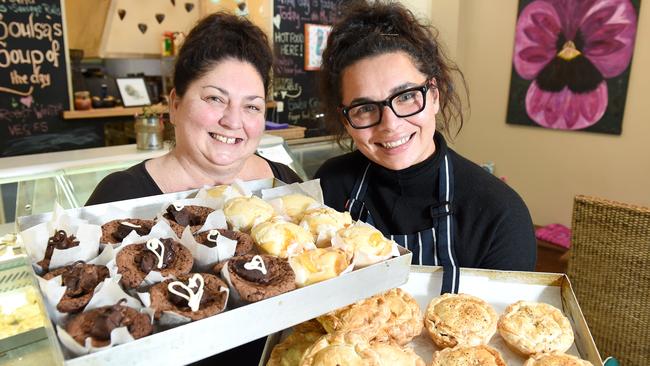 Soulsa Katering and Kafe worker Sandi Turner and owner Katie Bryant with a selection of pies. Picture: Jason Sammon.