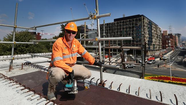 Joe Poke, carpenter with VEC Civil Engineering, at the location of the new foot bridge across the Brooker Highway from the Domain to the city. Picture: NIKKI DAVIS-JONES