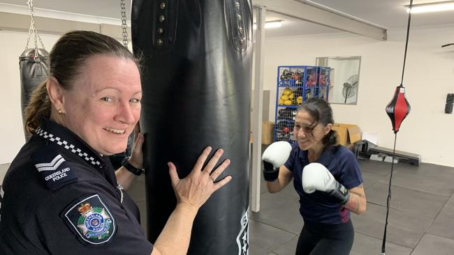 Senior Constable Catriona Burnett and boxing trainer Jessica Cashman are encouraging women who have experienced domestic violence to join free fitness classes at the Ipswich or Fernvale PCYC.