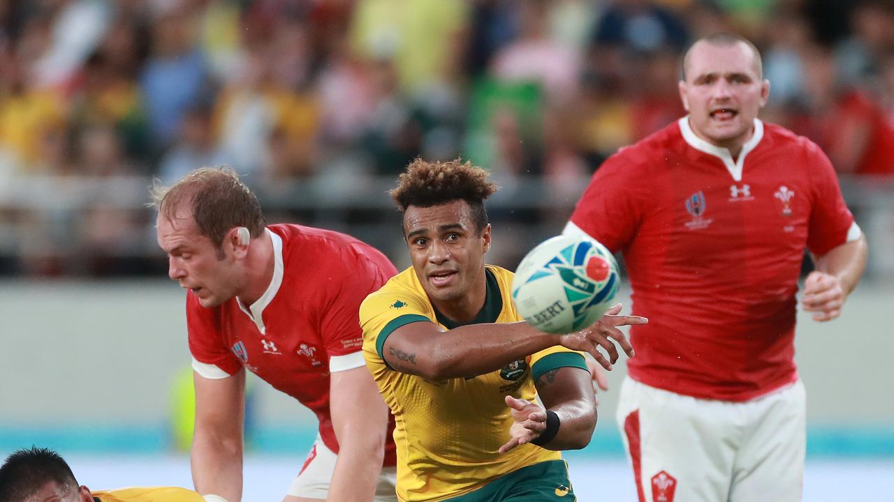 Will Genia of Australia passes the ball during