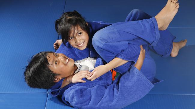 Giselle and Gerrell Quigg train at Blacktown City Judo Club.