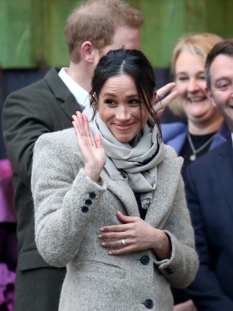 Prince Harry (R) and his fiancee Meghan Markle visit Reprezent 107.3FM on January 9, 2018 in London, England. The Reprezent training programme was established in Peckham in 2008, in response to the alarming rise in knife crime, to help young people develop and socialise through radio. Picture: Getty Images