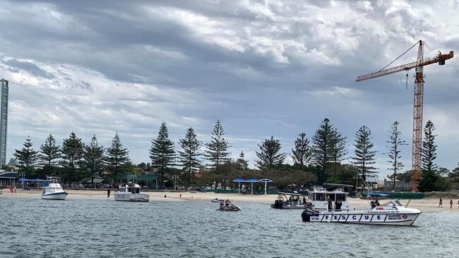 Police and VMR at the scene of the houseboat fire. Picture: Deanna Nott