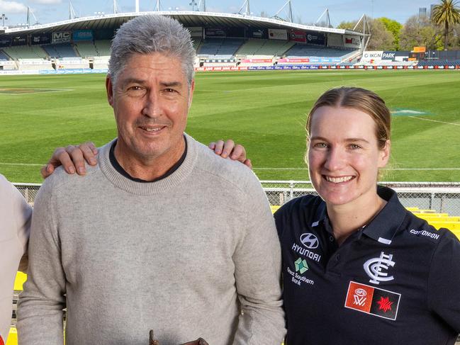 MELBOURNE, OCTOBER 1, 2024: Highlighting the 1000th Carlton game played for premiership points at IKON Park. Representing AFL Jarrad Waite holds the match ball from the last AFL match played in round 9, 2005.  Representing VFL is Stephen Kernahan holding a bronzed boot from his 200th match as Carlton captain in round 14, 1996. Representing AFLW is Breann Moody. Picture: Mark Stewart