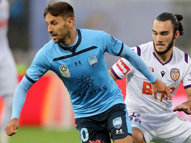 SYDNEY, AUSTRALIA - MARCH 14: Milos Ninkovic of Sydney FC and Nicholas Dagostino of Perth Glory during the round 23 A-League match between Sydney FC and the Perth Glory at Netstrata Jubilee Stadium on March 14, 2020 in Sydney, Australia. (Photo by Scott Gardiner/Getty Images)