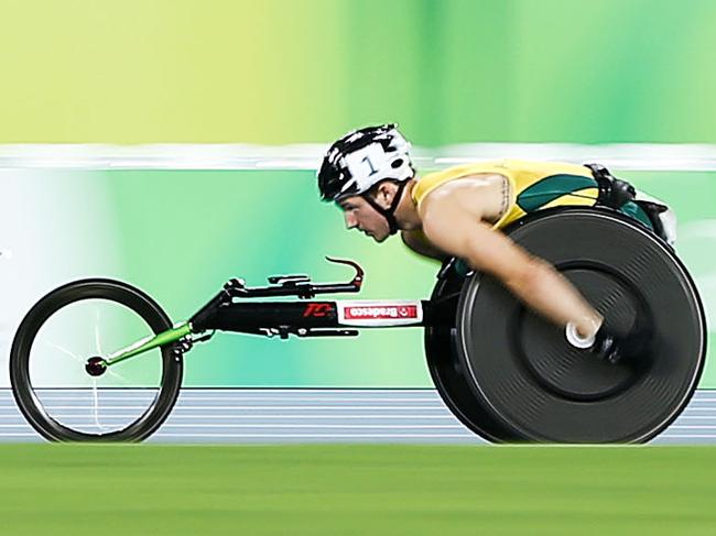 RIO DE JANEIRO, BRAZIL - SEPTEMBER 14:  L to R, Walid Ktila of Tunisia, Mohamed Alhammadi of United Arab Emirates and Rheed McCracken of Australia compete in the Men's 800 T34 final on day 7 of the Rio 2016 Paralympic Games at Olympic Stadium on September 14, 2016 in Rio de Janeiro, Brazil.  (Photo by Hagen Hopkins/Getty Images for the New Zealand Paralympic Committee)